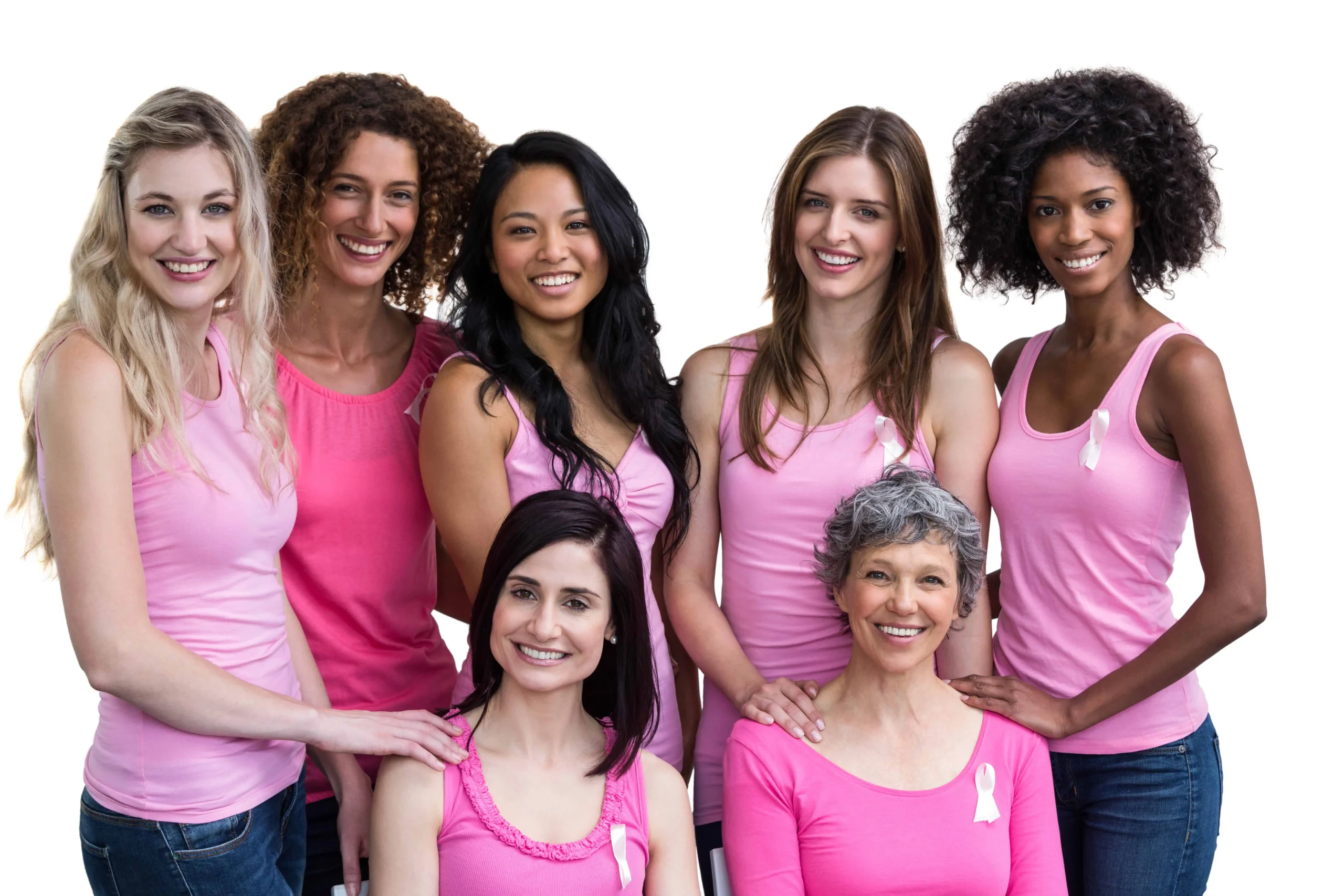 group of diverse women of various ages all wearing pink and smiling